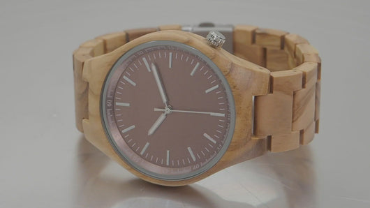 Zebrawood wooden watch spinning on turntable