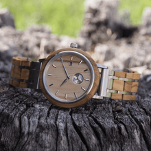 Load image into Gallery viewer, Olive wood and stainless steel watch laying on tree trunk

