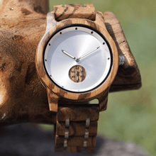 Load image into Gallery viewer, zebrawood and stainless steel wooden watch with subdial on a branch
