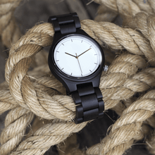 Load image into Gallery viewer, Ebony wooden watch laying on rope
